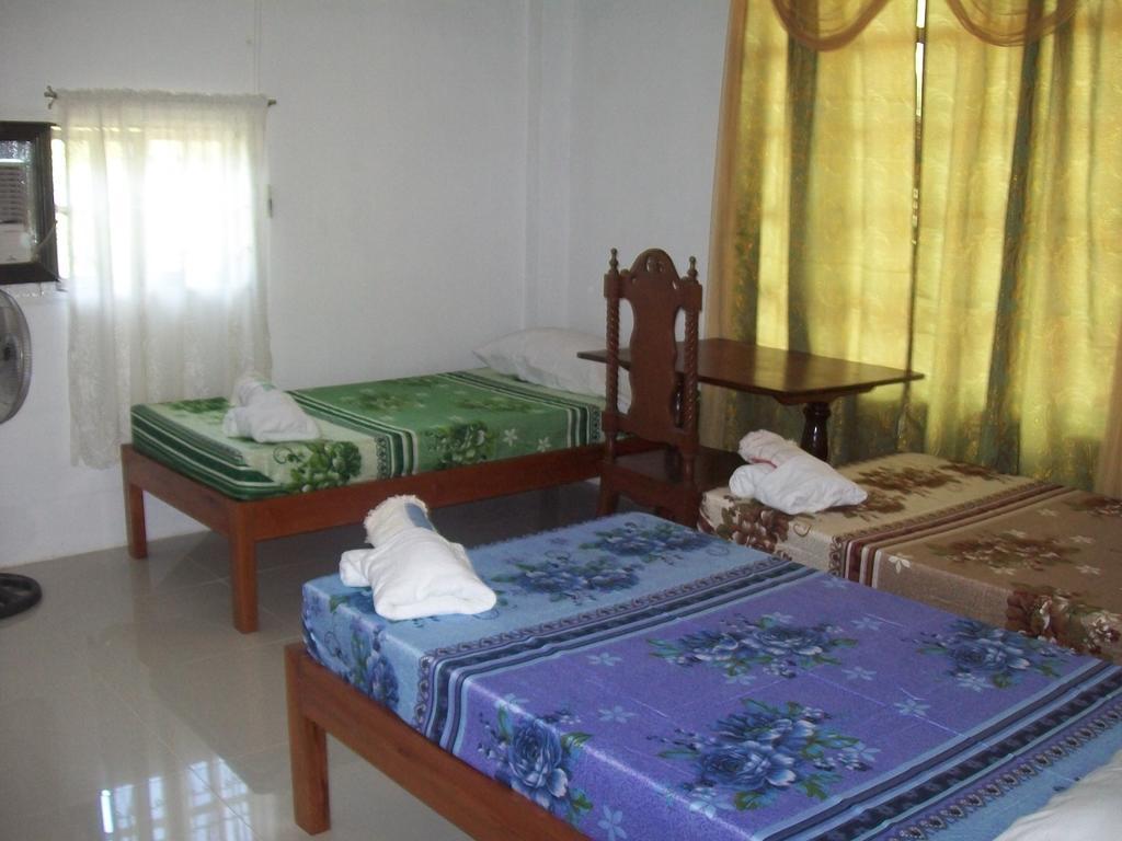 Charm Guest House Puerto Princesa Phòng bức ảnh